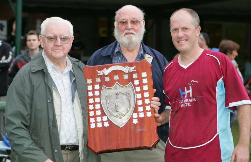 Tom Blackmore (left) and Len Bolden present Shoalhaven Heads/Berry's Brad Page with the Blackmore Bolden Shield in 2010. Photo: ROBERT CRAWFORD