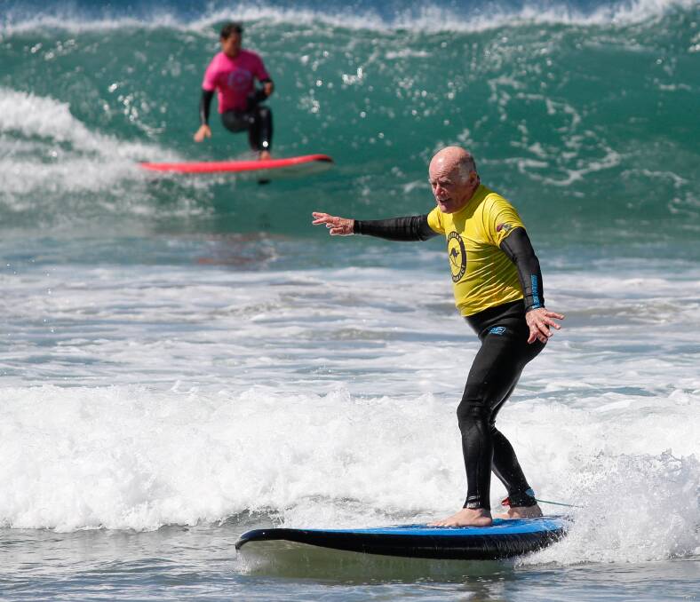 INSPIRATION: Seventy-six-year-old Vietnam veteran Gary Tearle hits the waves. Photo: Levi Cahill