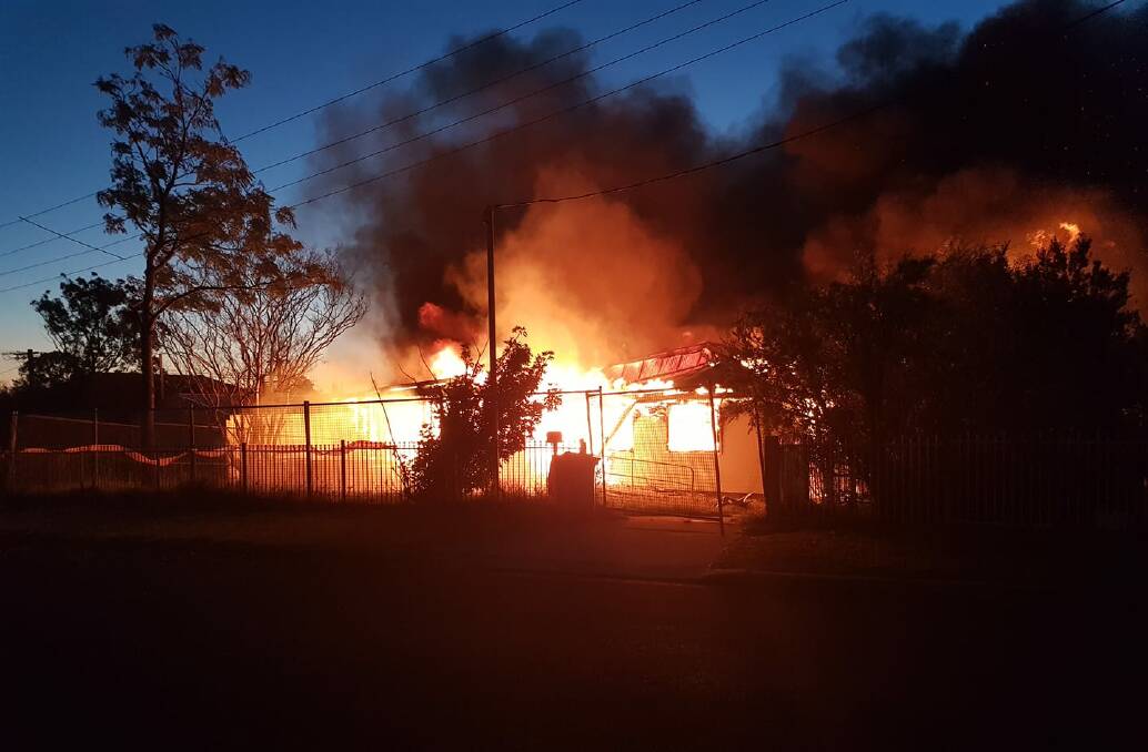 BIG BLAZE: The home in Hobart Street, east of Nowra was fully alight when fire crews arrived just after 6am Monday. Photo: Tim Tancred - Facebook