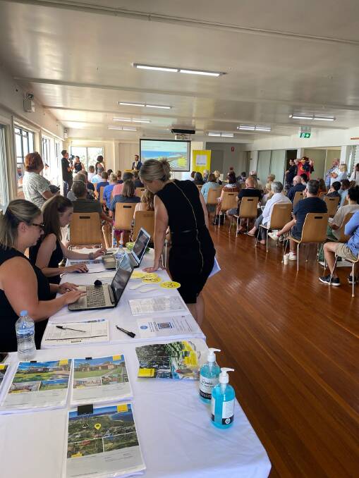 KEEN INTEREST: One hundred bidders were registered for Ray White South Coast's auction on Sunday, along with a further 200 registered to watched the auction online, 70 people inside the hall, and another 30 outside. Ten properties sold for $17.5 million. Photo supplied