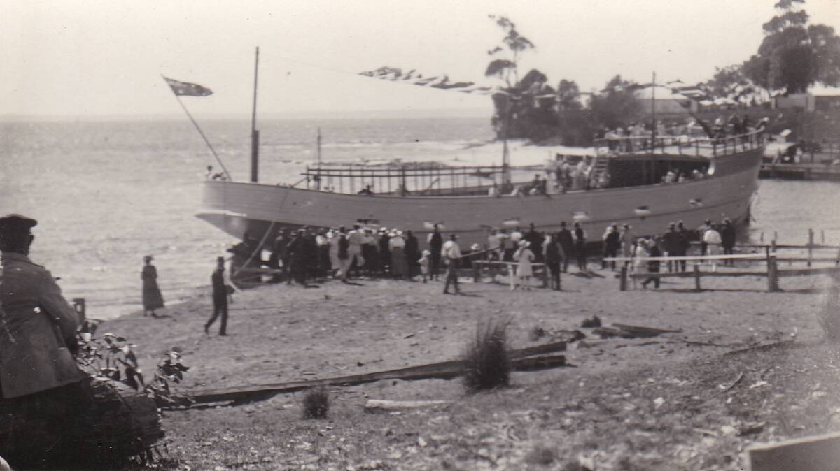 EXCITING: The launch of steamship, Currambene at Huskisson in February 1922 was a big event with "motor buses from Nowra" travelling to the seaside village so locals could witness the launch. Photo: Shoalhaven Historical Society.