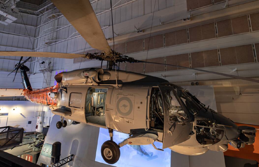 STILL FLYING HIGH: The new S-70B Seahawk helicopter exhibit was opened at the Australian National Museum Maritime, Sydney, by Chief of Navy, Vice Admiral Mike Noonan. Photo: Rodrigo Villablanca
