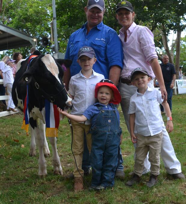 GREAT DAY: Junior Champion Holstein for the Furn Garratty Memorial was Timissa Kingdoc Ava shown by seven-year-old Beau Chittick. Beau is pictured with his proud parents Tim and Melissa and brother Mitchell and sister Ruby.