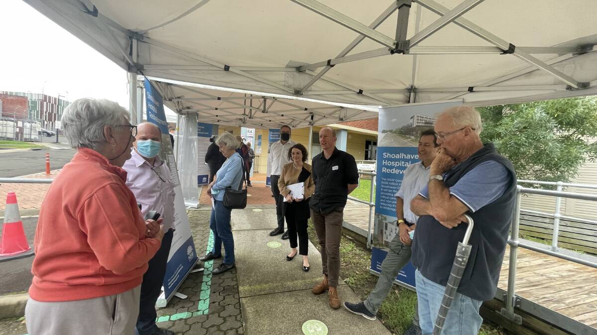 NEW FACILITIES: Shoalhaven District Hospital general manager Craig Hamer (second from left) explains some of the new hospital's designs to local residents at Wednesday's pop-up session.