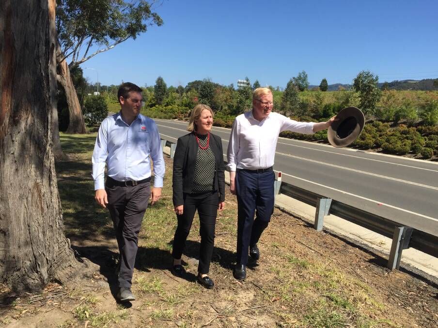NEW PLAN: Kiama MP Gareth Ward inspects the site of the new noise walls at south Berry near Windsor Drive with Transport for NSW Senior Project Manager Ryan Whiddon and Transport for NSW Southern Regional Director Sam Knight.