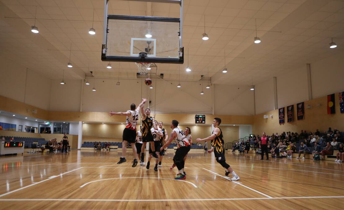 SHOT: Action from the Shoalhaven Tigers and Spring Scorchers clash on Saturday night.