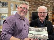 PROUD MOMENT: South Coast Register senior journalist and one of Alan Clarks former long-time work colleagues Robert Crawford (left) officially launched On This Day in the Shoalhaven at the Nowra Museum on Saturday.
