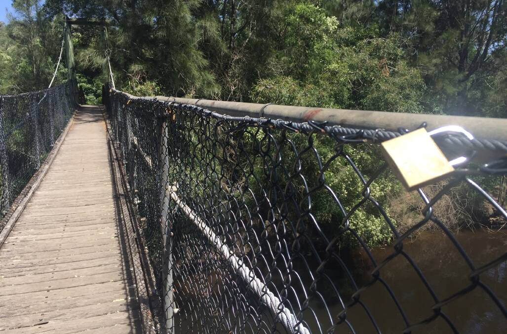 IS LOVE IN THE AIR? Almost a dozen love locks are on the suspension bridge over Nowra Creek on Bens Walk.