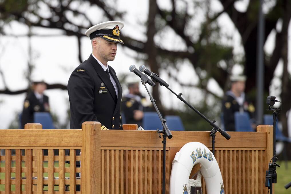 RECORD NUMBERS: Commanding Officer of the Royal Australian Naval College, Commander David Shirvington addresses the graduates of NEOC 62 assembled on the parade ground at HMAS Creswell. Photo: Kelvin Hockey 