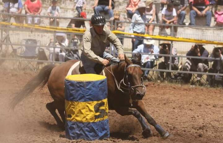 ON THE PACE: Terry Bennett in action in the barrel race.
