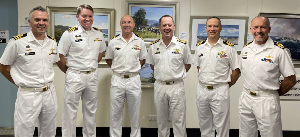 LEADERSHIP TEAM: Commanding Officer of the Fleet Air Arm, Commodore Dave Frost (fourth from the left) with Fleet Air Arms leadership team, the commanding officers of all the squadrons based at HMAS Albatross (from left) Commander Marcus Baxter, 725 Squadron, Commander Sam Dale, 723 Squadron, Commander William Veale 822X Squadron, Commander Lee Pritchard, 816 Squadron, and Commander Paul Hannigan, 808 Squadron.