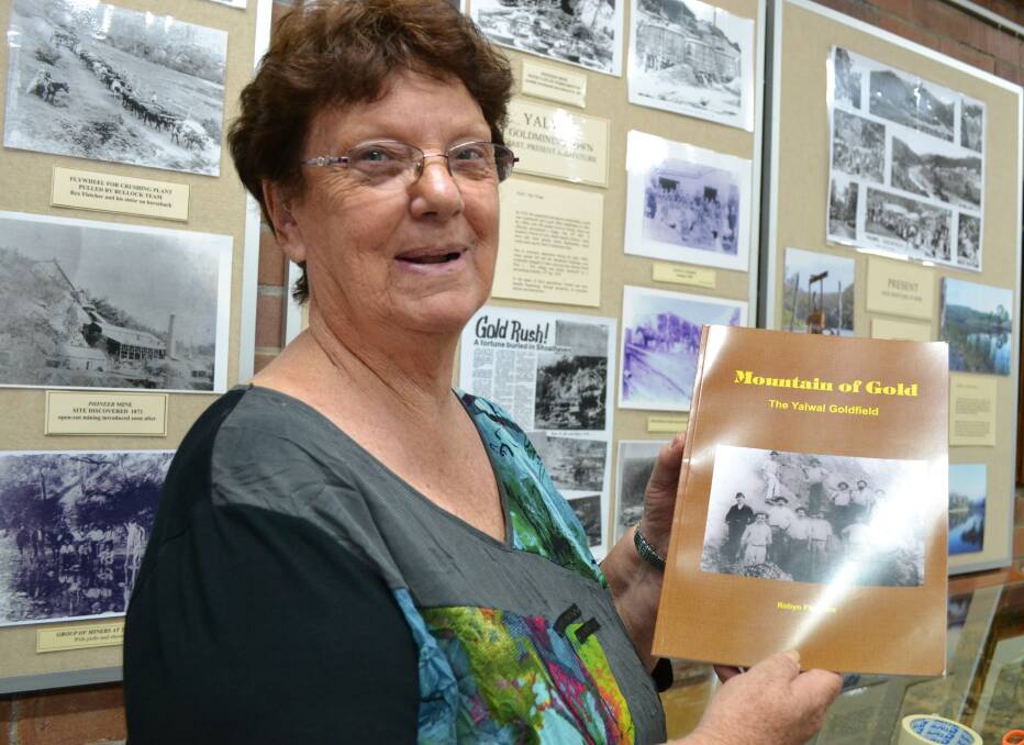 GREAT STORY: Shoalhaven historian Robyn Florance with her her latest book, Mountain of Gold about local gold mining town Yalwal.