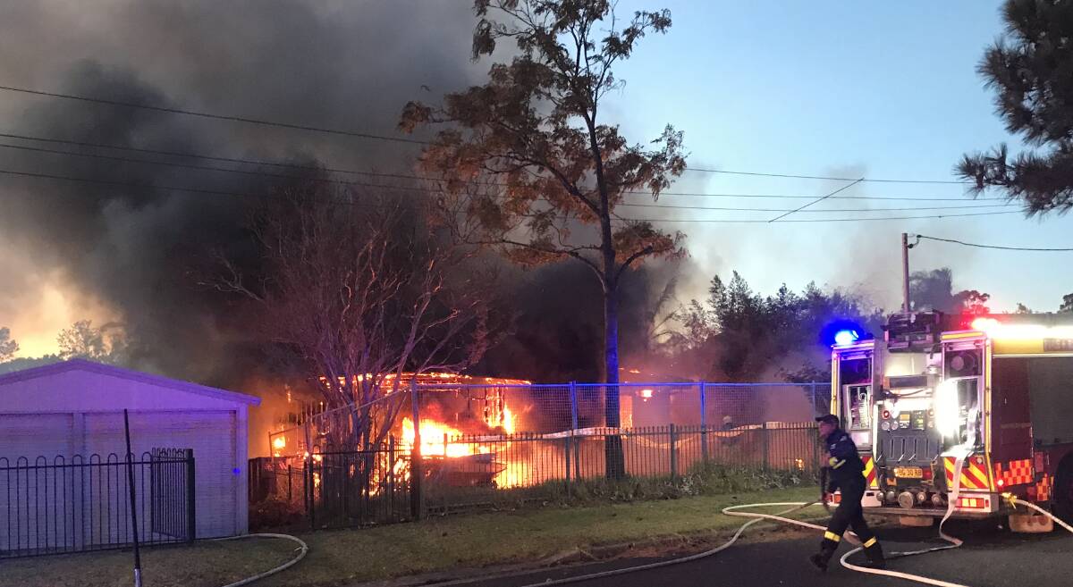 Fire and Rescue NSW Nowra and Shoalhaven crews battle Monday morning's house fire.