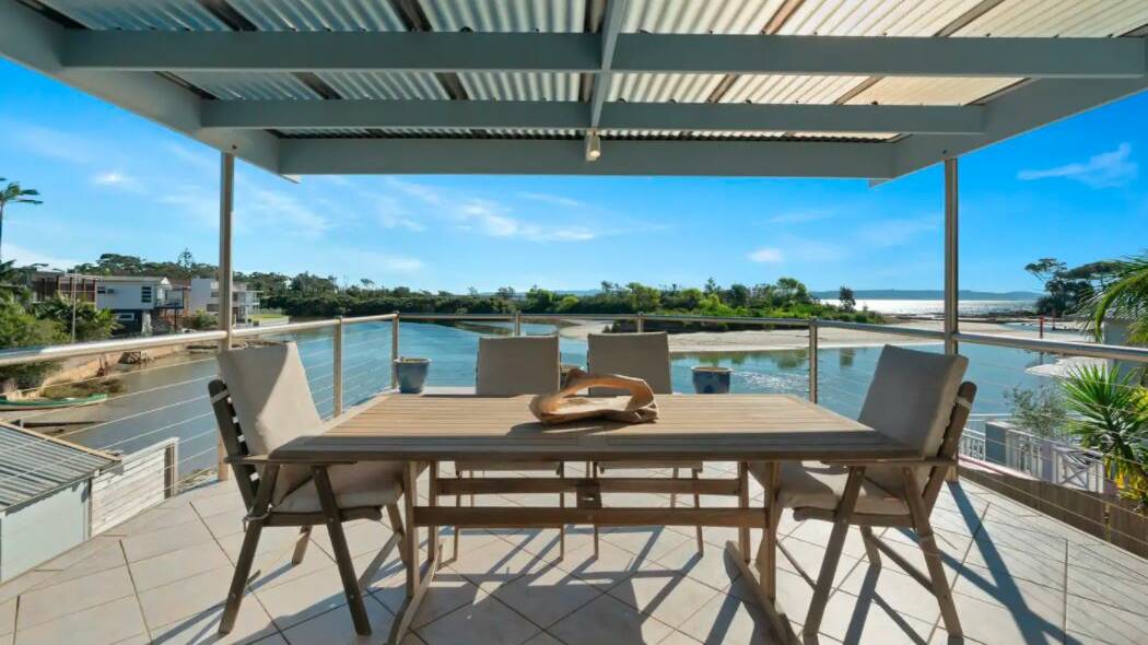 WOW: Imagine waking up to this every day! The stunning four-bedroom, three-bathroom waterfront home is on teh market in Currarong. Image supplied.
