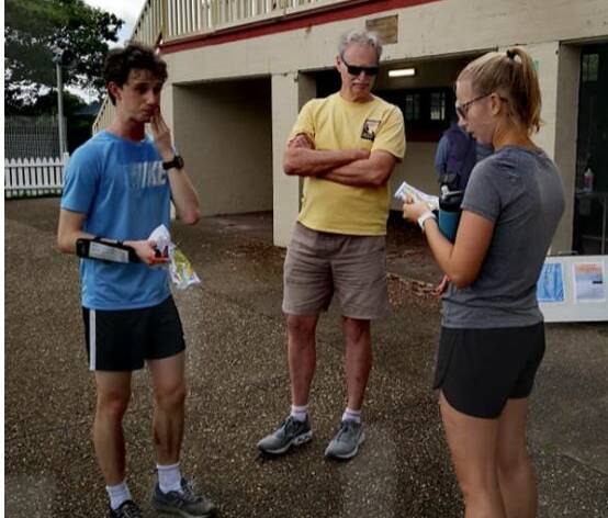 TIMES: Discussion by finishers on how they navigated around their respective course. Image: Supplied