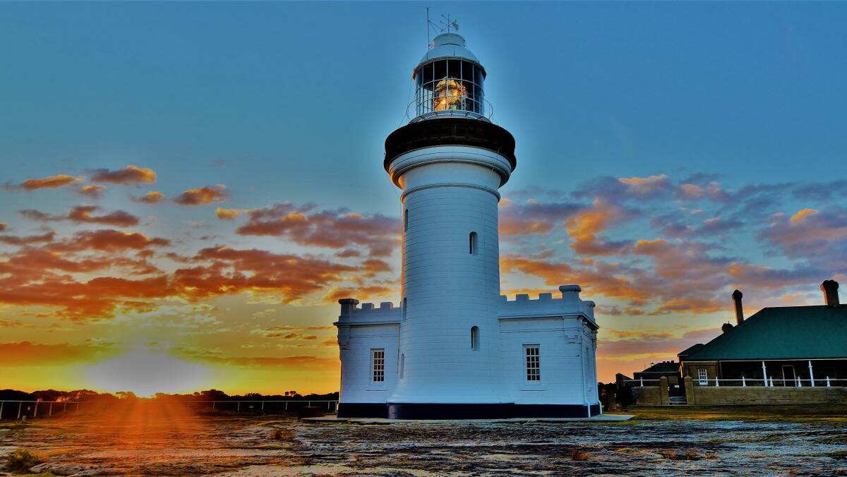 A beautiful sunset over Point Perpendicular Lighthouse. Photo Dannie and Matt Connolly Photography