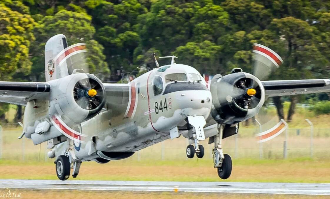 TAKE OFF: HARS Navy Heritage Flight Tracker 844 takes off from Shellharbour Regional Airport. Photo: Howard Mitchell.