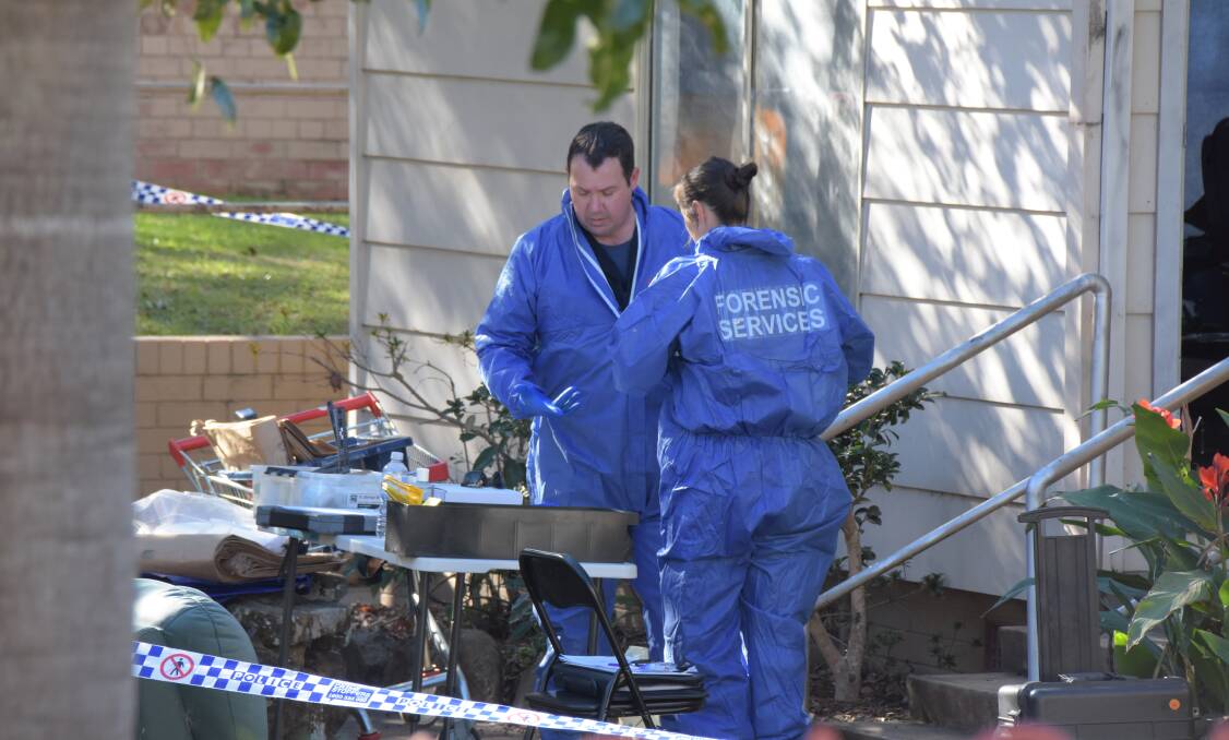 NSW Police forensic officers have been at a Nowra unit for more than 24 hours gathering evidence.
