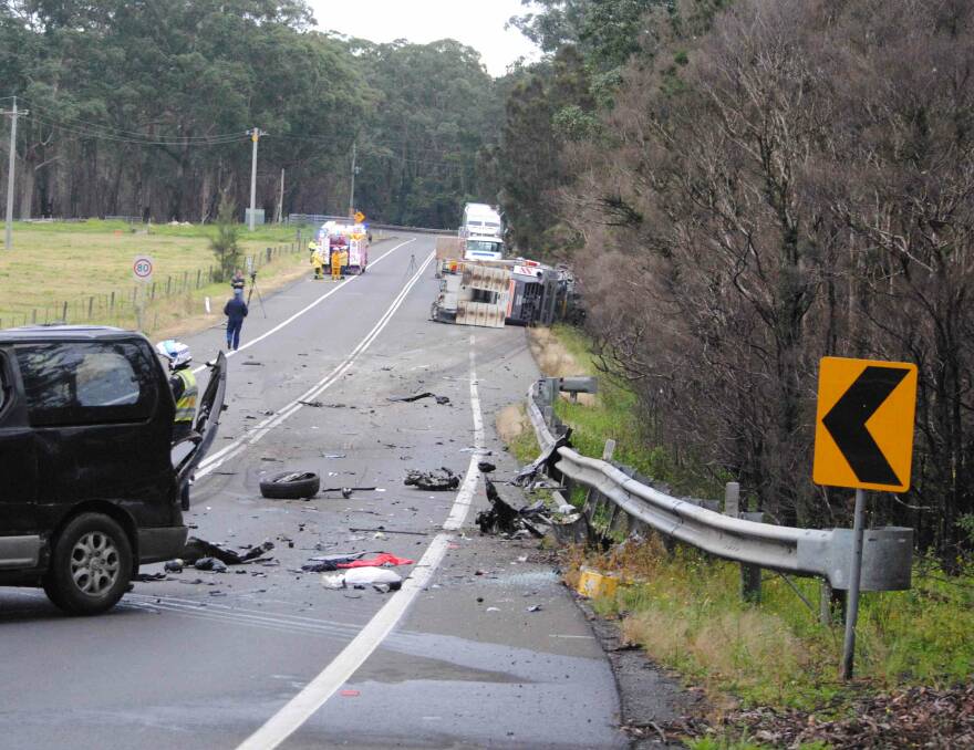 HORROR SCENE: A 36-year-old Wandandian man died in Thursday morning's accident on the Princes Highway at Bewong. Photo: Damian McGill
