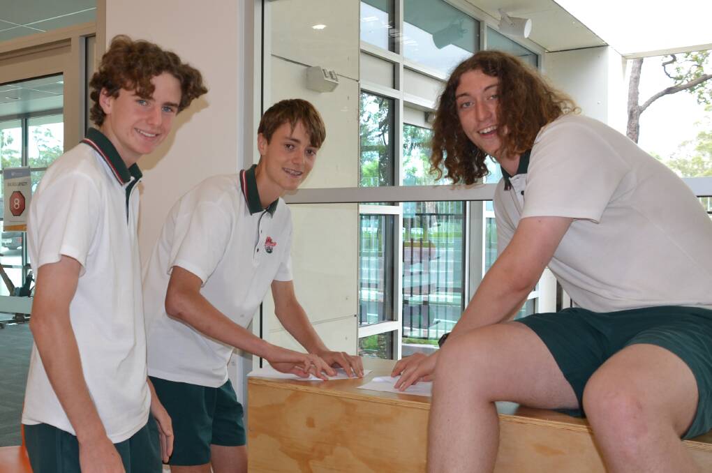 PLANNING: Bomaderry High's Brynn Carlile, Tom Fletcher and Tom Speer work on their creations.