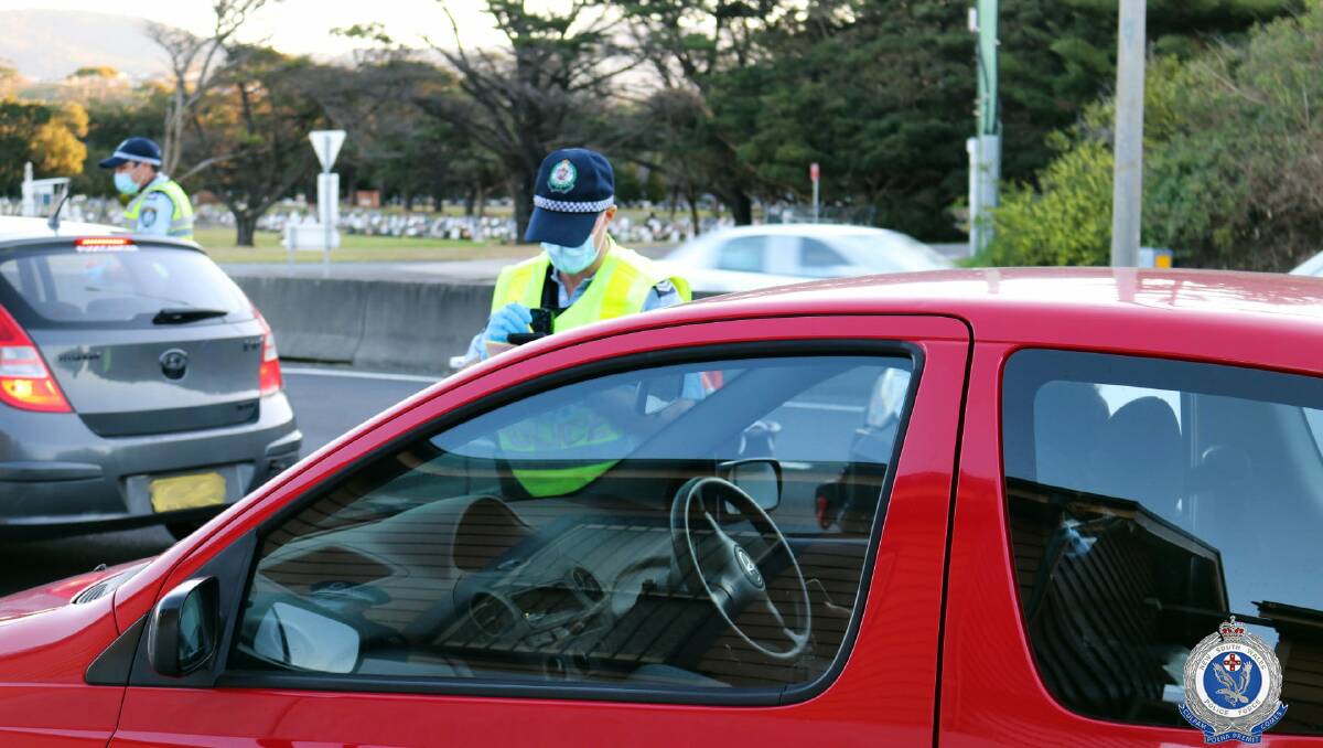 CHECK: South Coast Police undertaking COVID compliance checks along the Princes Highway at Bombo. Image: NSW Police