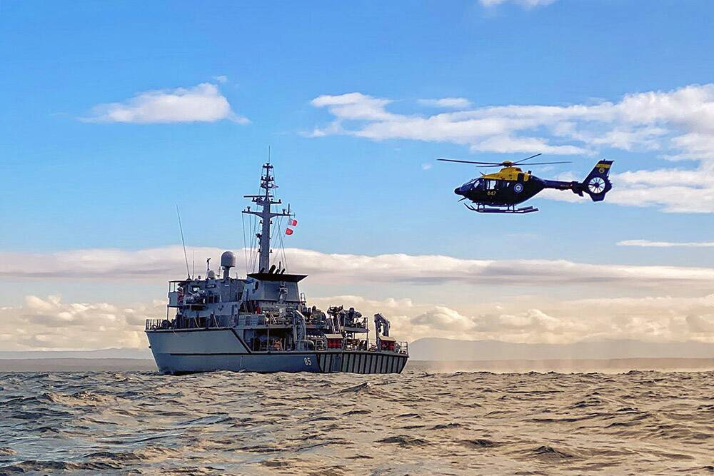 IN ACTION: HMAS Gascoyne at sea conducting aviation operations during her unit readiness evaluation with an EC-135 T2+ helicopter from the ADF's helicopter training squadron 723 at HMAS Albatross.