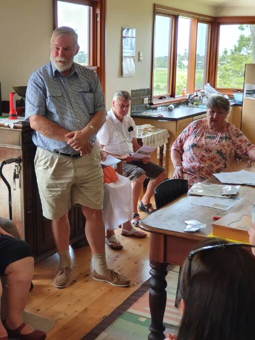 WHAT A GIFT: Gerringong and District Historical Society life member John Graham talks before presenting a letter carried by Sir Charles Kingsford Smith on his Seven Mile Beach flight to New Zealand, which is signed by the three crew and two passengers.