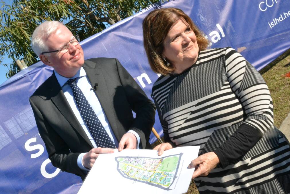 Kiama and South Coast MPs Gareth Ward and Shelley Hancock look over the proposed master plan for Shoalhaven District Hospital.