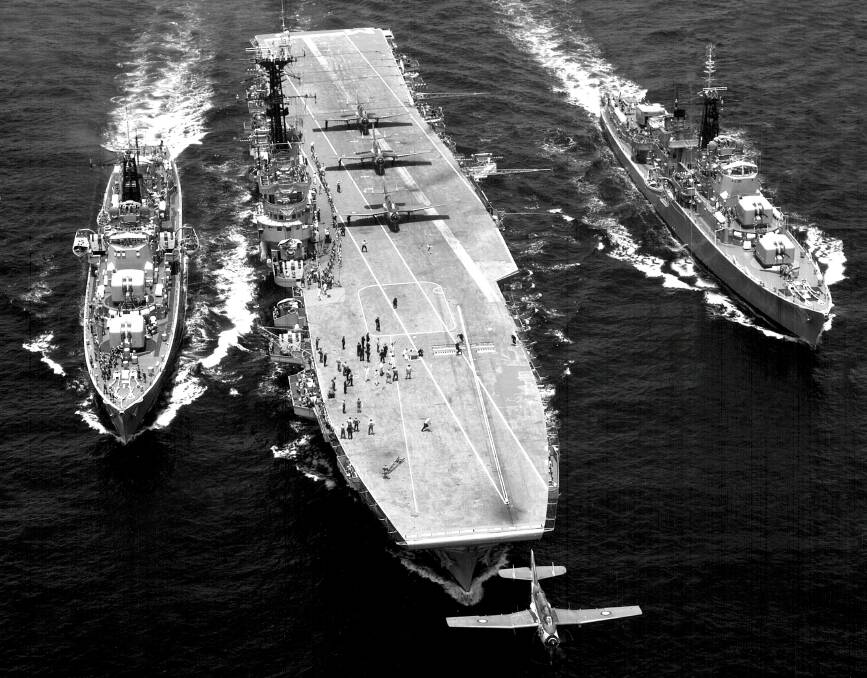 ACTION: HMAS Melbourne II with HMA Ships Vendetta and Voyager. RAN Gannet aircraft are seen operating from Melbourne. Photo: Royal Australian Navy