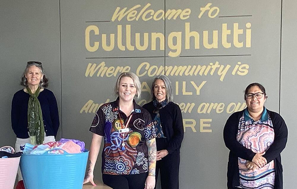BACKING: Chief Petty Officer Linda Eddington (left) and Albatross paralegal Denise Tucker (second from right) deliver donations from HMAS Albatross to Cullunghutti Aboriginal Child and Family Centre staff.