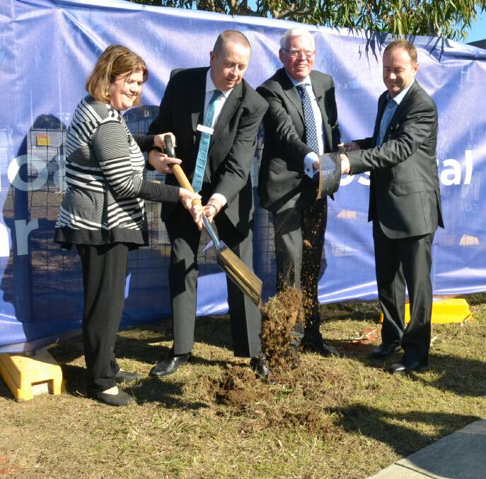 South Coast MP Shelley Hancock and Kiama MP Gareth Ward turn the first sod for the new $10.8m multi-deck car park at Shoalhaven Hospital with hospital general manager Ian Power (left) and Chris Horton, of Health Infrastructure.
