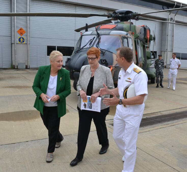 Defence Minister Marise Payne (centre) with Gilmore MP Ann Sudmalis and  Commander Fleet Air Arm, Commodore Chris Smallhorn during a visit at HMAS Albatross.