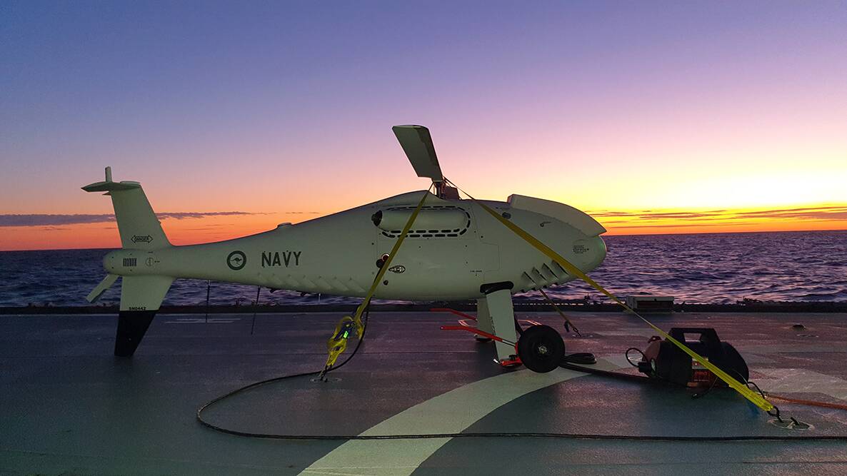 READY TO GO: The S-100 Camcopter sits on HMAS Ballarats flight deck. Photos: Michael Mulquiney, Markus Winhofer