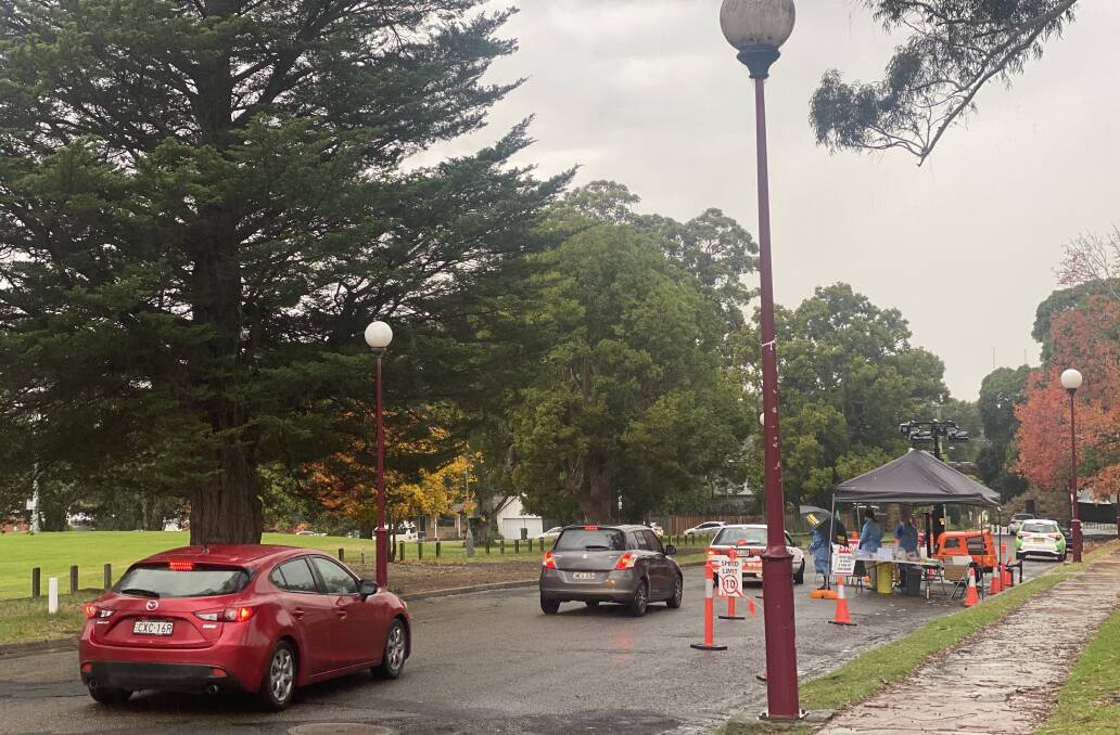 TESTS: Even Thursday's rain didn't deter more than 2000 people getting a COVID-19 test in the Illawarra Shoalhaven Local Health District. Photo: Grace Crivellaro
