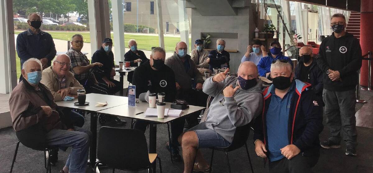 BACK ON THE WALK: Members of the Keith Payne VC Veterans Benefit Group catch up for a coffee at the Shoalhaven Entertainment Centre after the relaunch of the Walk to Talk event on Friday.