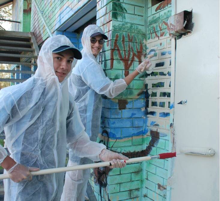 HARD AT IT: Australian Air Force Cadets 330 Squadron (City of Shoalhaven) volunteering to remove graffiti.