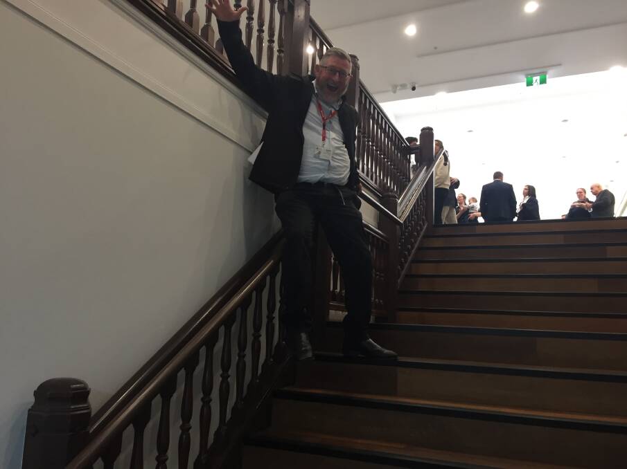 JUST HAD TOO: Sorry I couldn't help it - I took a slide down the new banister at the refurbished historic Spotlight building in the Nowra CBD.