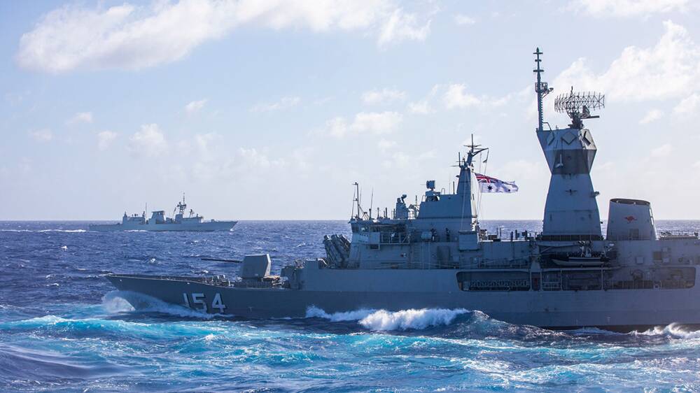 TRIPLE TREAT: HMAS Parramatta and HMCS Ottawa during Exercise Pacific Vanguard 2019 for the East Asia Deployment. Parramatta has been awarded the Duke of Gloucesters Cup for 2019, for her exemplary conduct in a year of deployments and the Spada Shield, which is presented to the surface unit that has excelled in all aspects of operations and warfare. 816 Squadrons MH-60R Seahawk helicopter, Medusa, embarked on Parramatta was awarded the Collins Trophy for the most proficient embarked helicopter flight. Photo: Tara Byrne 