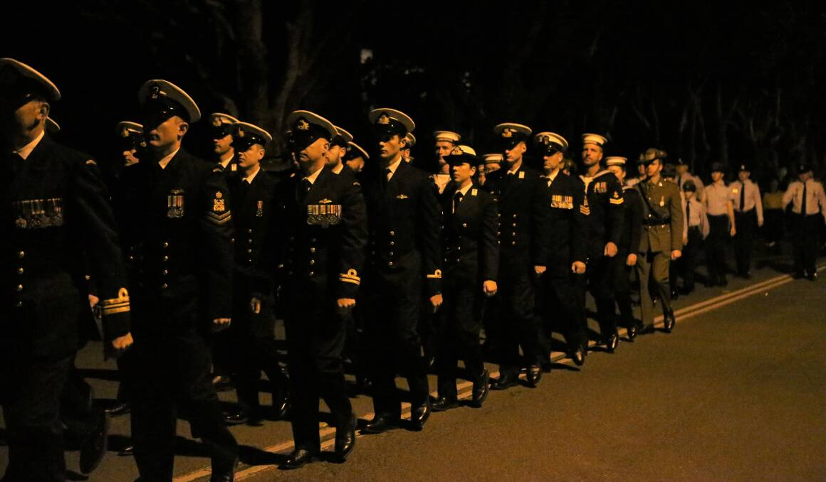 MARCH: Personnel from HMAS Albatross march in the Greenwell Point dawn march.
