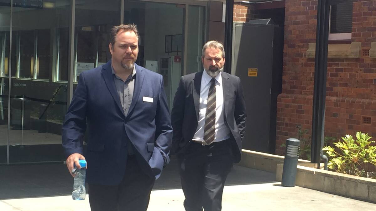 Shoalhaven District Hospital Acting Director of Nursing Brad Scotcher (right)  leaves the coronial inquest into toddler Troy Almond's death in Nowra.
