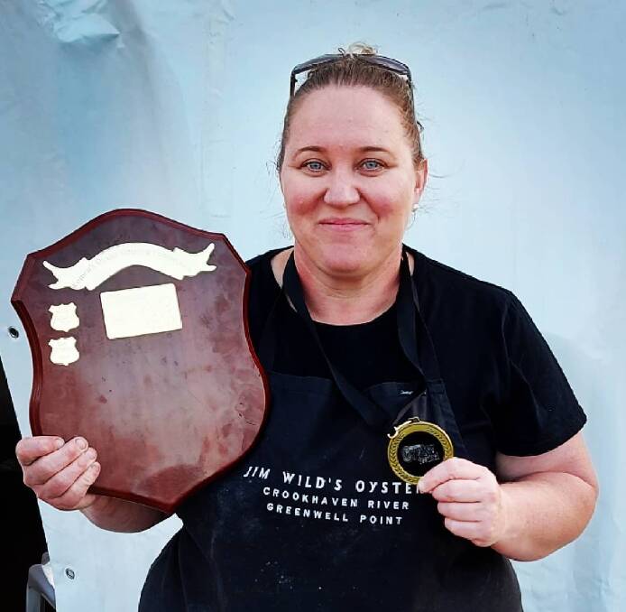  CHAMPION: Sally MccLean from Jim Wilds Oysters at Greenwell Point proudly shows off the 2021 Narooma Oyster Festival shucking title.
