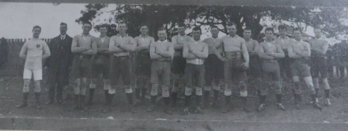 ROVERS: Harry Regan (third from left back row) with the Pyree Rovers 1919 (back row) A Bush (manager), G Coulthart, H Regan, T Caddell, J Coulthart, H Watts, D Dudgeon, W Coulthart. Front row: G Headley (Referee), M Regan, O Wilson, F Armstong, A Smith, J Wilson, R Jones and J Caddell photographed on their home ground on a paddock behind the figtree on East Street. Photo: Fred and Alison Nevill