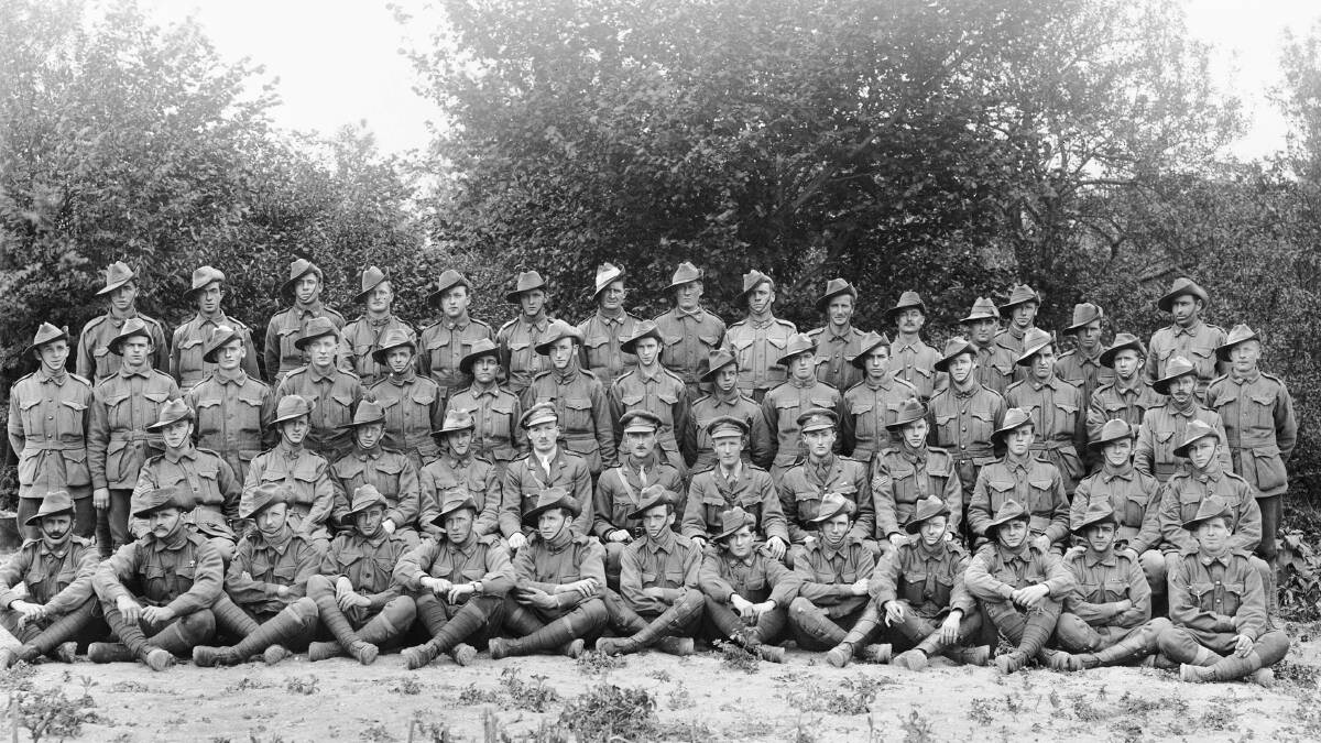 Ulric Walsh (fifth from right second front row) in a group portrait of the 5th Light Trench Mortar Battery. Australian War Memorial