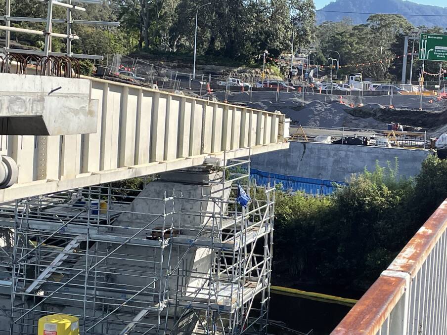 WITHIN REACH: The new $342m Nowra bridge is within sight of the northern bank of the Shoalhaven River. Photo: Robert Crawford