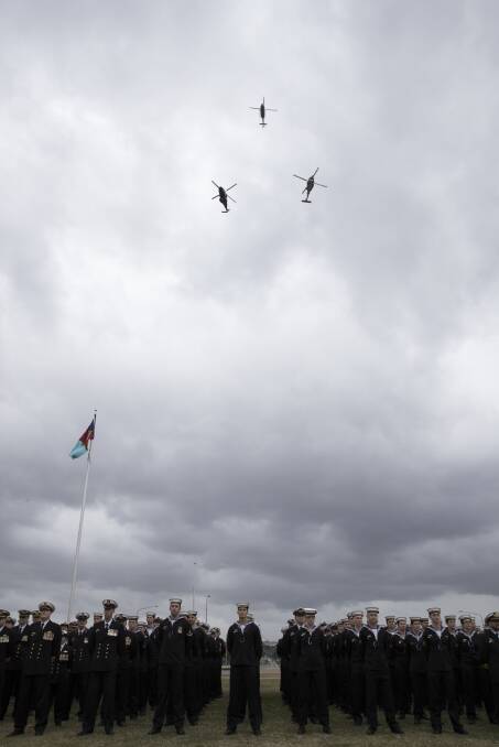 A fly past consisting of a Multi Role Helicopter MRH-90 Taipan, Bell 429 Global Ranger and a Sikorsky MH-60R Seahawk during the change of command parade at Russell Offices, Canberra.Photo: Jason Silsby

