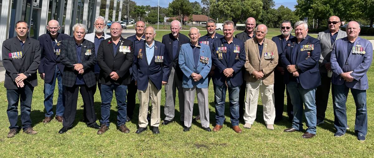 PROUD: Bob Brown and Rusty Marquis with members of the Keith Payne VC Veterans Benefit Group.