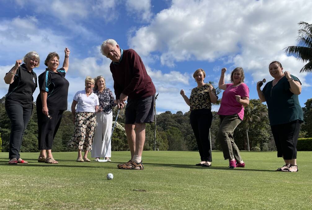ON PAR: Shoalhaven Business Chamber secretary David Goodman has a practice put at the Nowra Golf Club watched by SSPAN education officer Fiona Stasiukynas and secretary Wendi Hobbs, Shoalhaven Kids In Need president Margaret Goodman and treasurer Mary-Anne Calcraft, Shoalhaven Education Fund chair Sophie Ray and treasurer Katrina Norwood and golf day organiser and Shoalhaven Business Chamber member Hayley Byrne.
