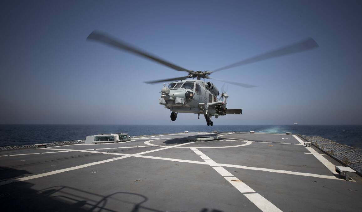 HMAS Warramunga’s deployed MH-60R Seahawk Romeo helicopter, Nemesis, from 816 Squadron at HMAS Albatross has a played a major role in its many drug busts in the Middle East. Photo: Tim Gibson