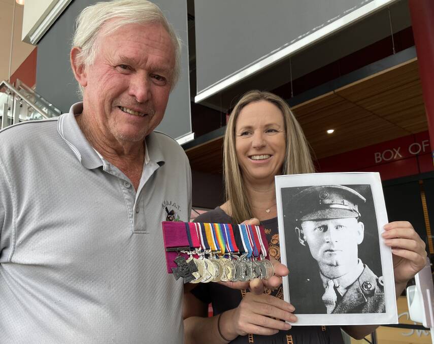 HONOUR: Regional Judson VCs great grandson Neil Lord and his daughter Janine proudly show off the replica set of his medals presented to the family by the Keith Payne VC Veteran Benefit Group.