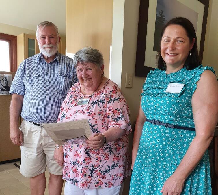 PRESENTATION: Gerringong and District Historical Society life member John Graham presents the precious letter to society president Helen McDermott with Gilmore MP Fiona Phillips.